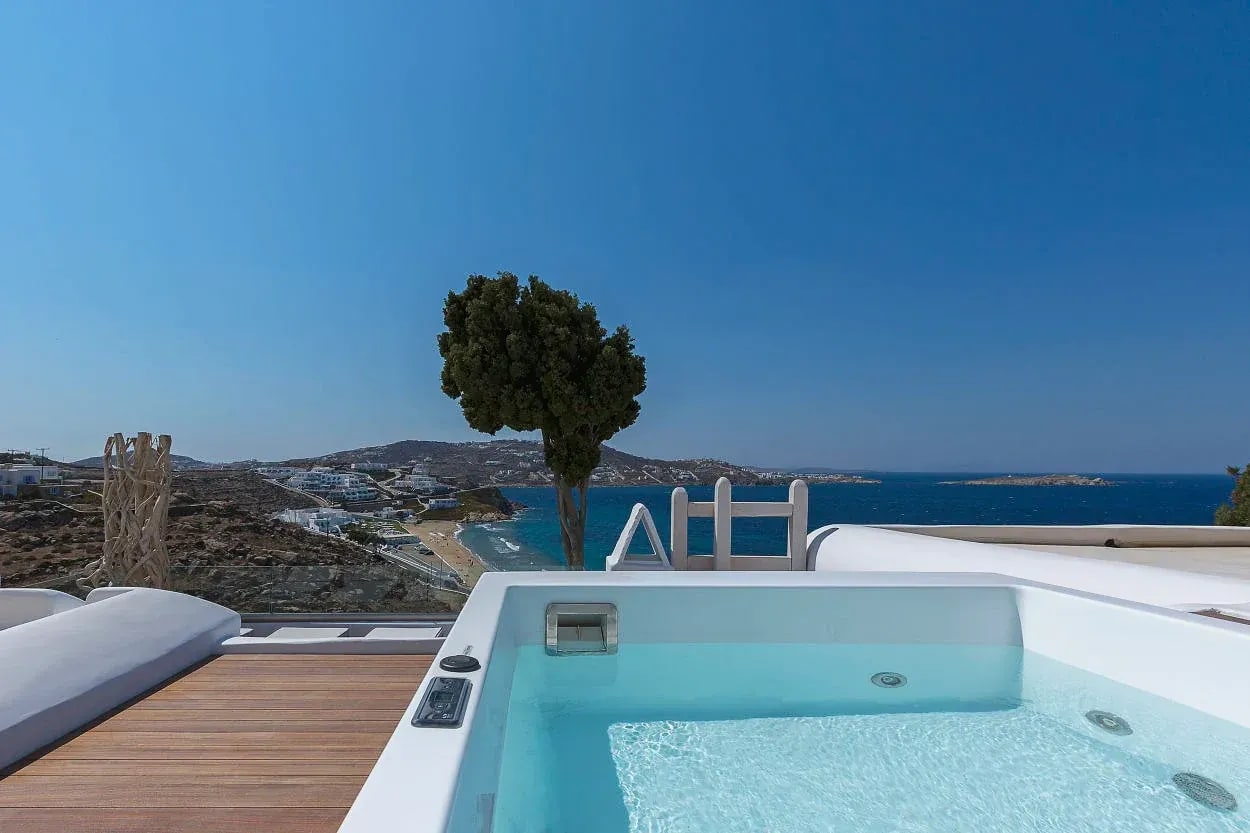 Hot tub on the private deck looking out over the bay