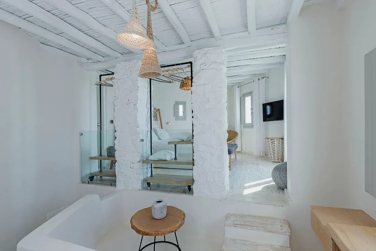 Textured plaster column and mirror in the Superior Suite interior